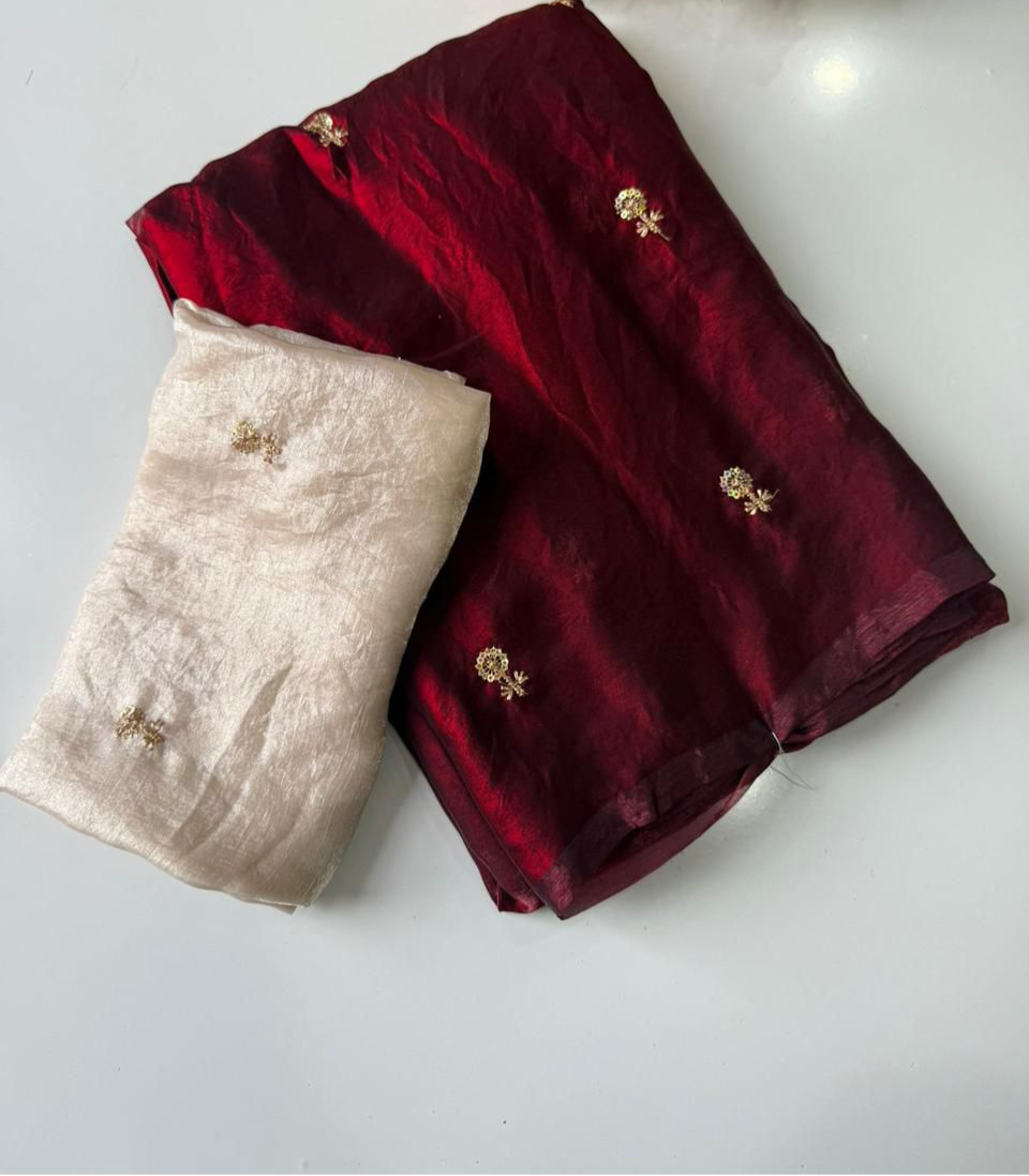 Multi sequence embroidery on dual shade satin